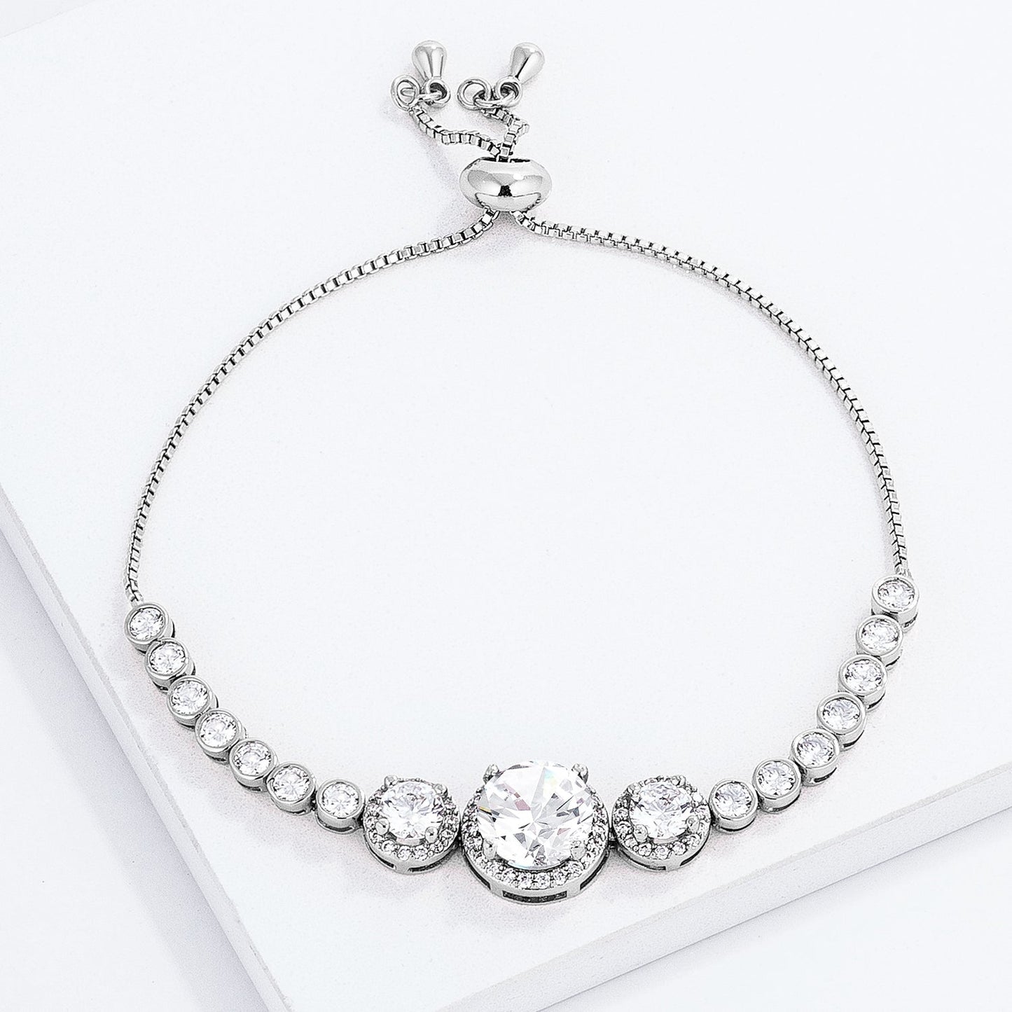 Adjustable Rhodium Plated Graduated Clear CZ Bolo Style Tennis Bracelet